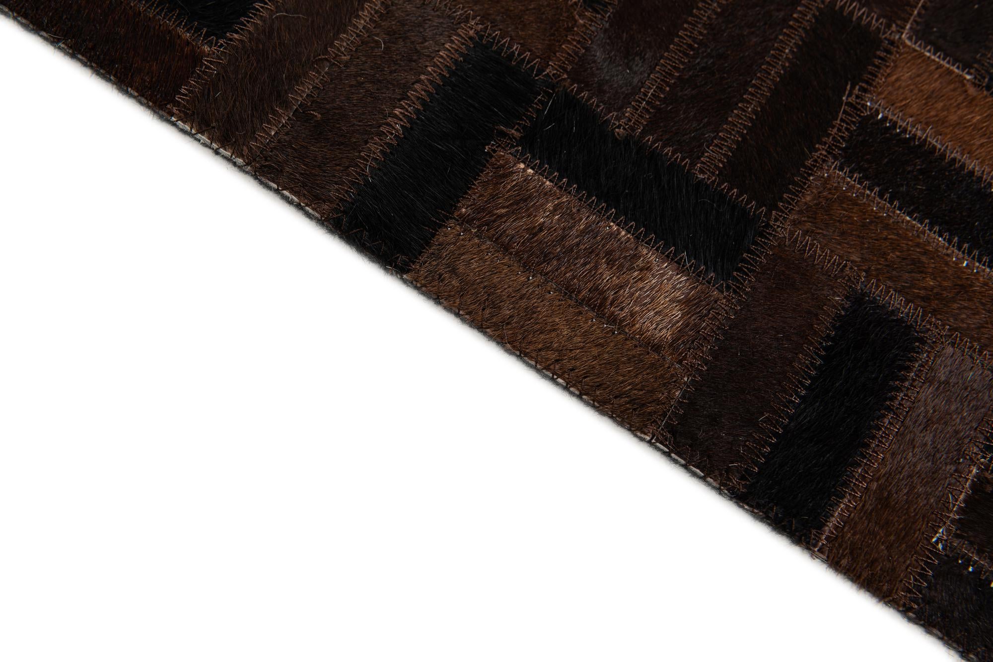 5' x 7' 11 Cowhide Stocks Rug