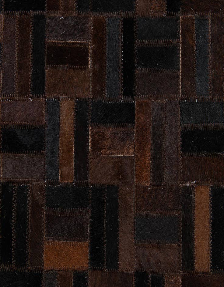 Detail image of 5' x 7' 11 Cowhide Stocks Rug