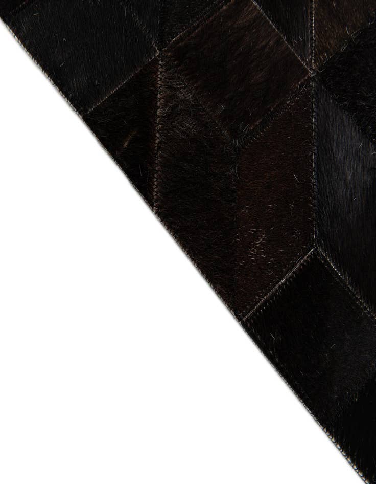 Detail image of 5' 2 x 8' Cowhide Stocks Rug