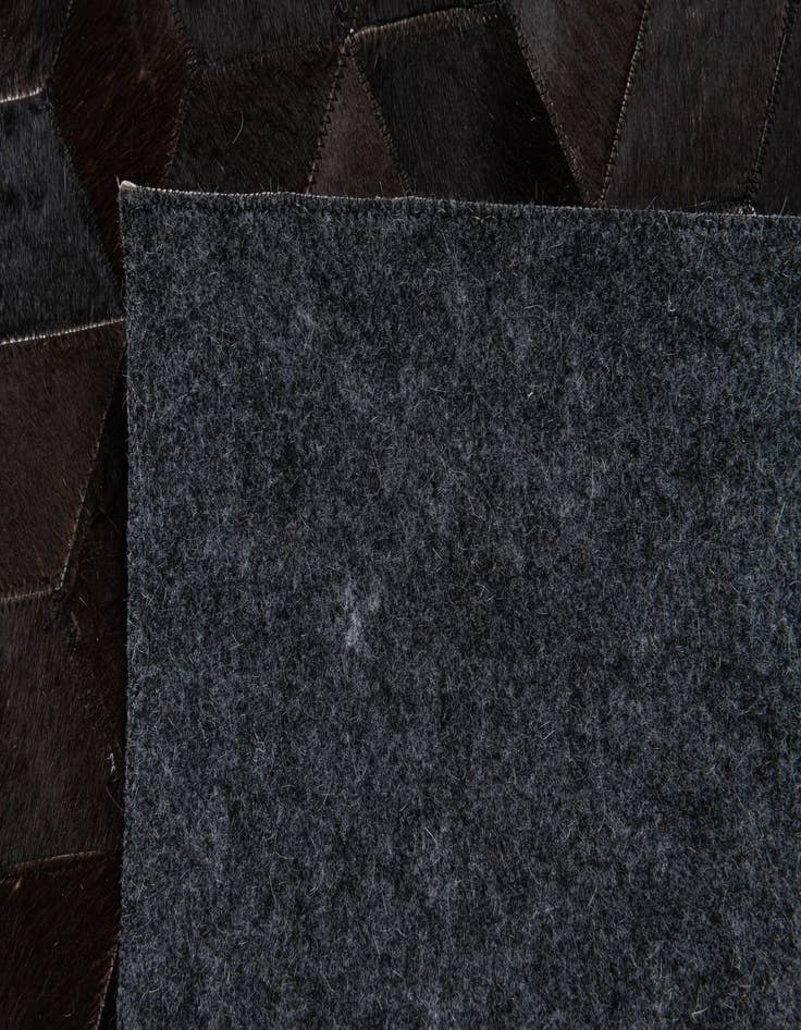 Detail image of 5' 2 x 8' Cowhide Stocks Rug