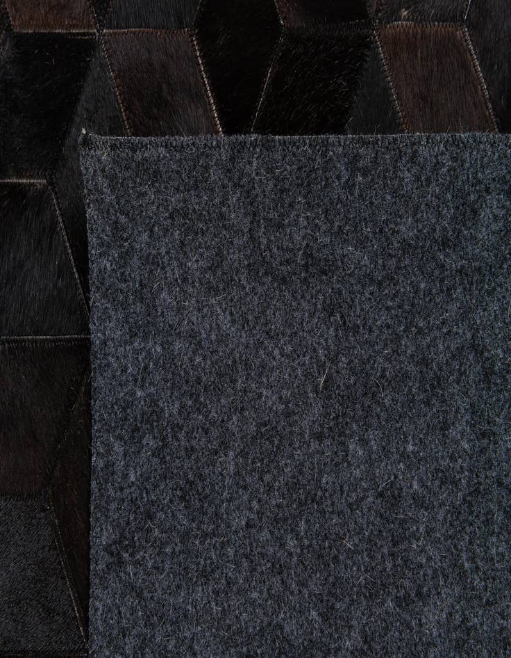 Detail image of 5' 2 x 8' Cowhide Stocks Rug