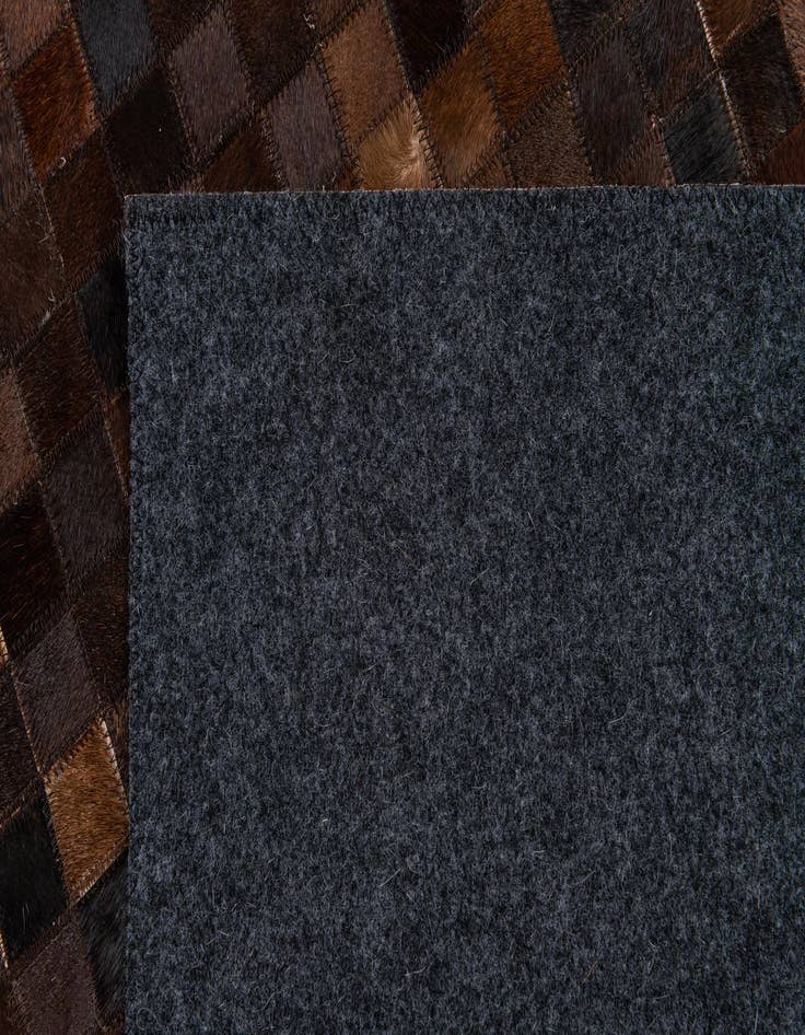 Detail image of 5' 1 x 8' Cowhide Stocks Rug