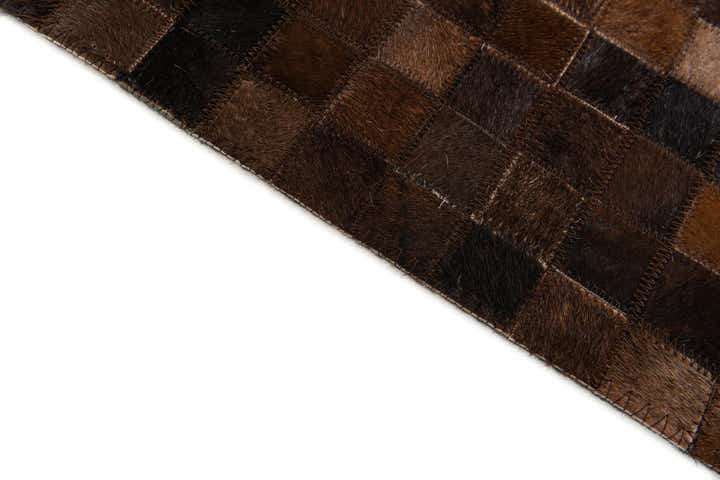 5' 2 x 7' 10 Cowhide Stocks Rug