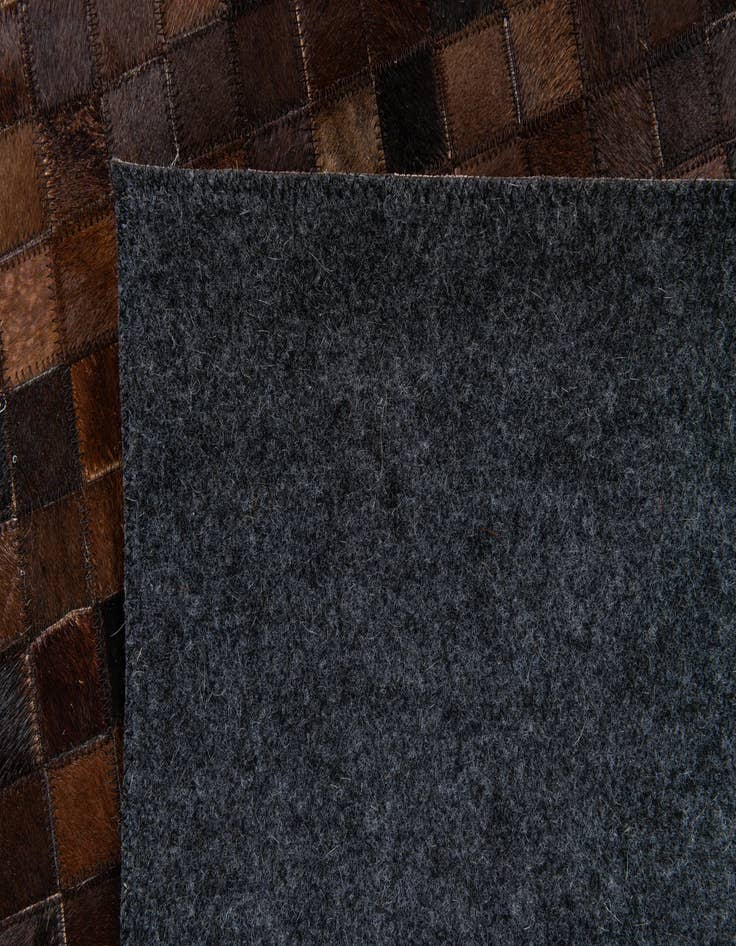 Detail image of 5' 2 x 7' 10 Cowhide Stocks Rug
