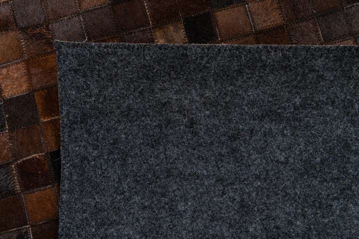 5' 2 x 7' 10 Cowhide Stocks Rug