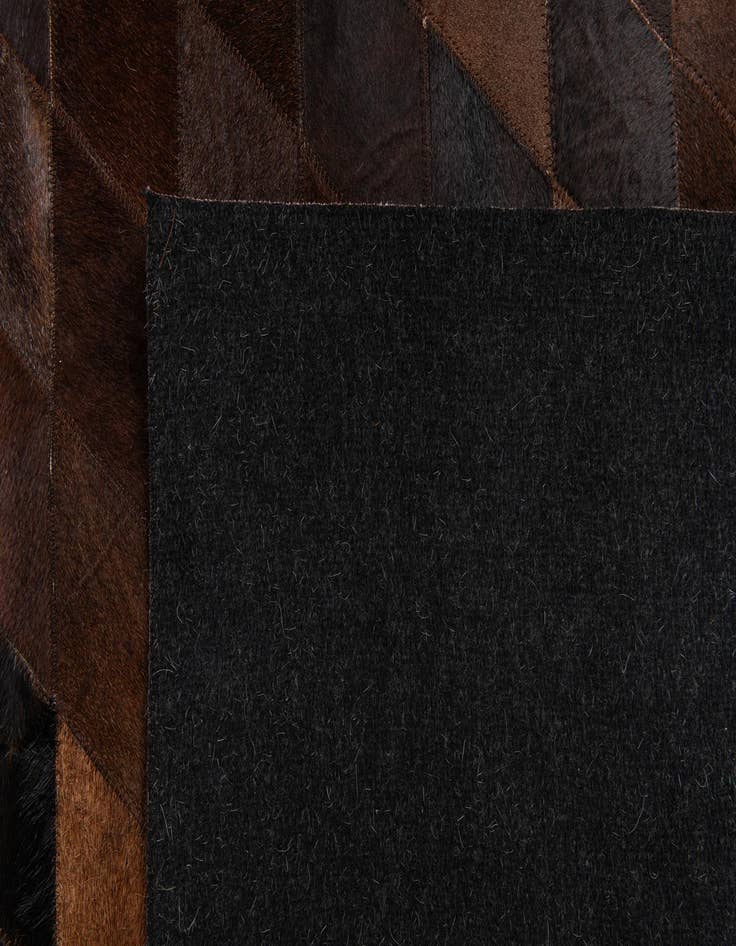 Detail image of 5' x 8' Cowhide Stocks Rug
