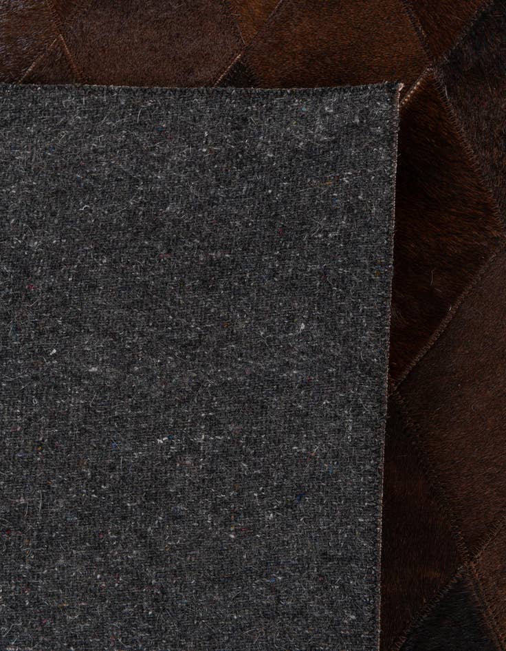 Detail image of 5' x 7' 11 Cowhide Stocks Rug