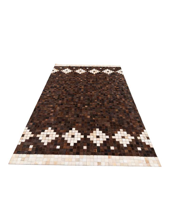 5' 1 x 8' 3 Cowhide Stocks Rug