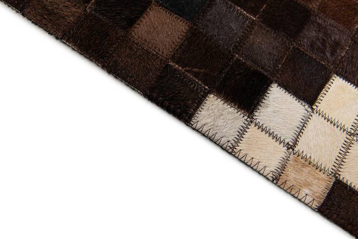 Detail image of 5' 1 x 8' 3 Cowhide Stocks Rug