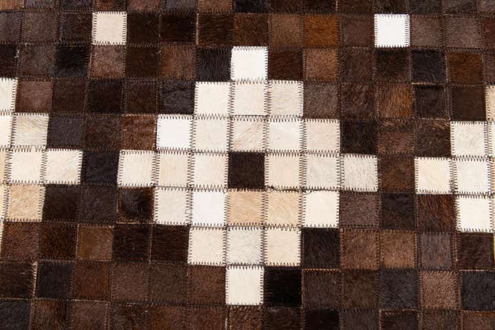 5' 1 x 8' 3 Cowhide Stocks Rug