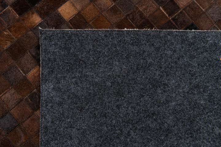 5' 1 x 8' 3 Cowhide Stocks Rug