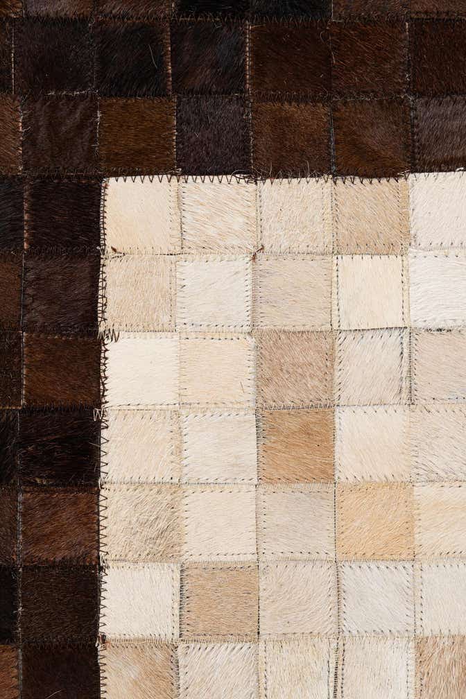 5' 1 x 7' 11 Cowhide Stocks Rug