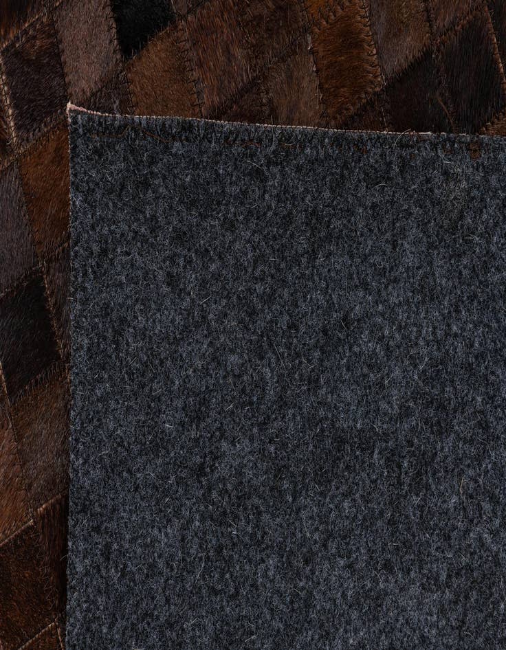 Detail image of 5' 1 x 7' 11 Cowhide Stocks Rug