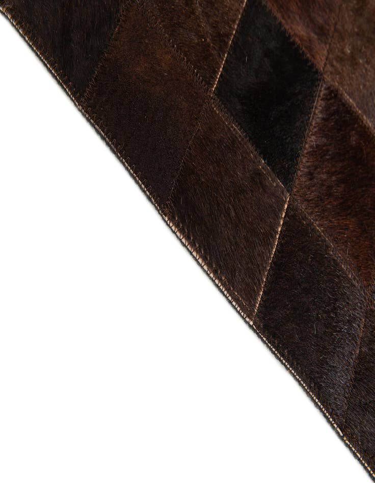 Detail image of 5' 2 x 8' Cowhide Stocks Rug