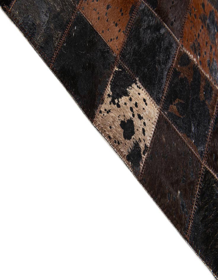 Detail image of 5' 1 x 8' 1 Cowhide Stocks Rug