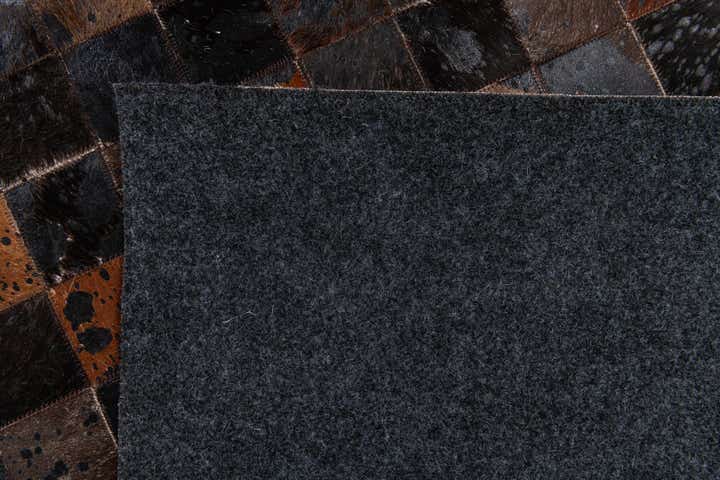 5' 1 x 8' 1 Cowhide Stocks Rug