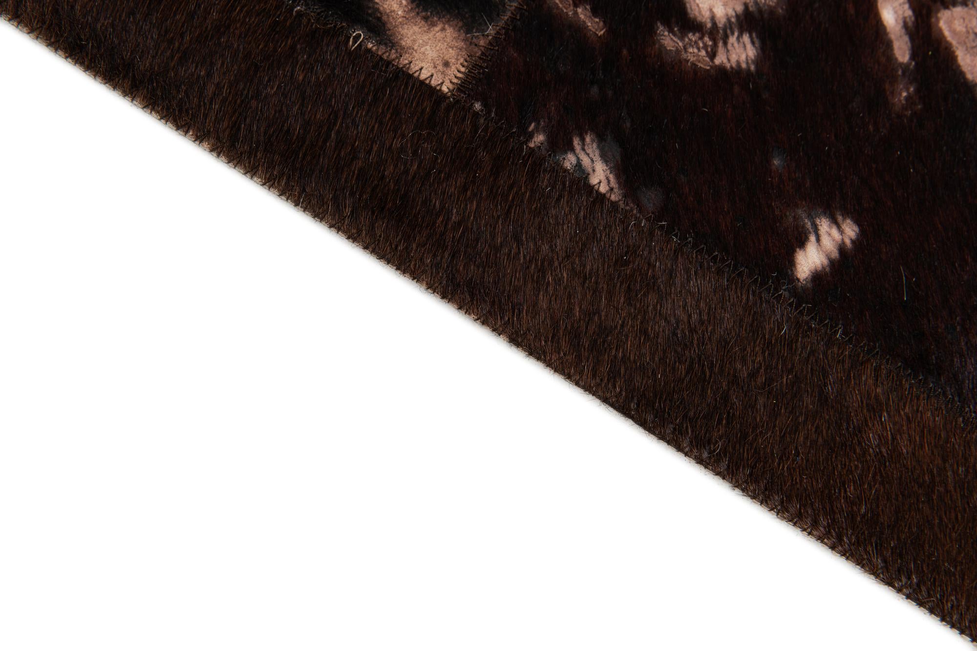 5' 2 x 8' 1 Cowhide Stocks Rug