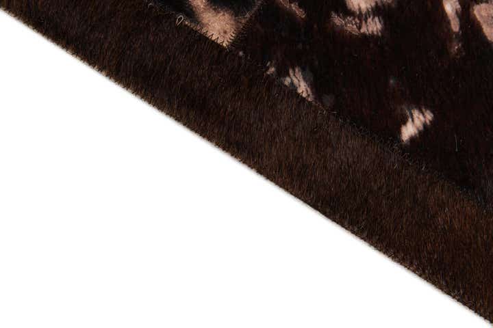 5' 2 x 8' 1 Cowhide Stocks Rug