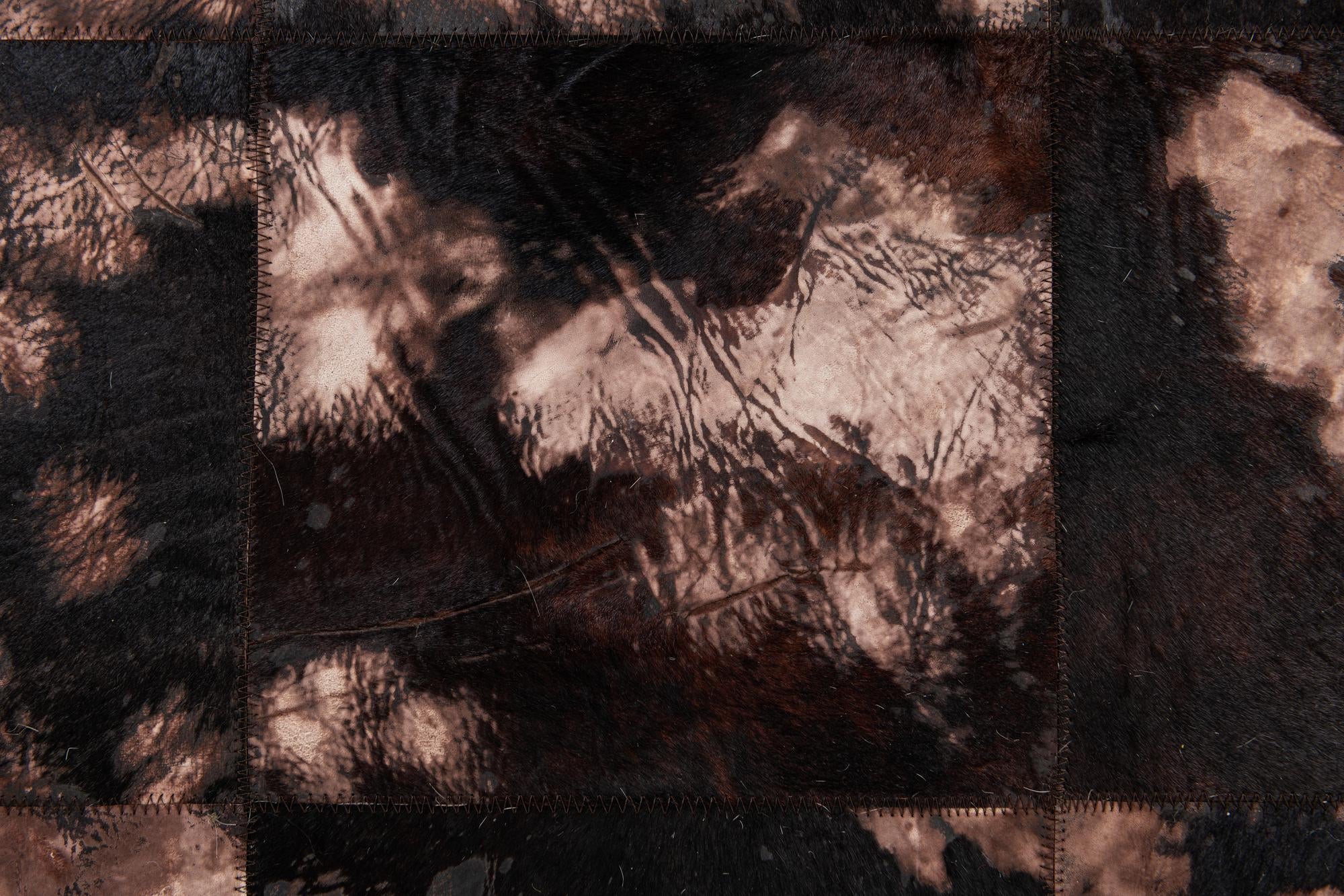 5' 2 x 8' 1 Cowhide Stocks Rug