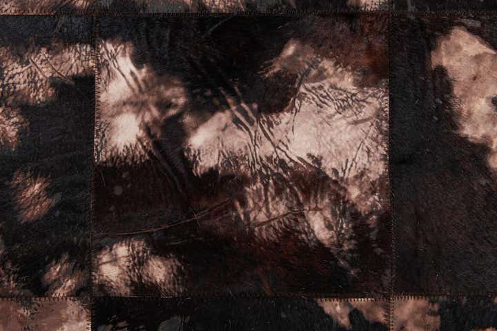 5' 2 x 8' 1 Cowhide Stocks Rug