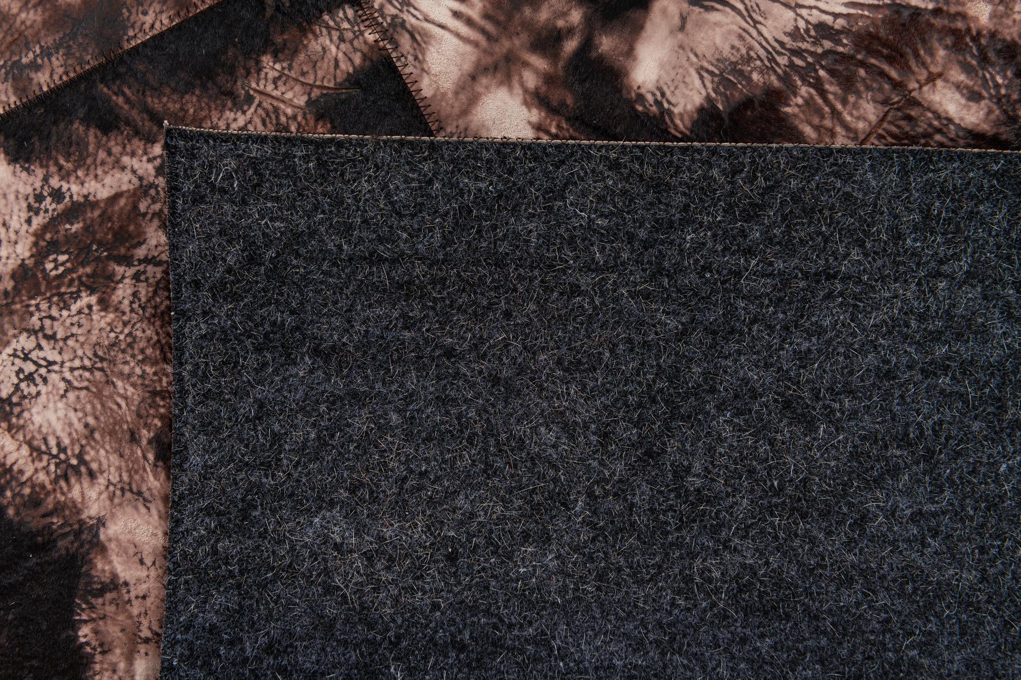5' 2 x 8' 1 Cowhide Stocks Rug