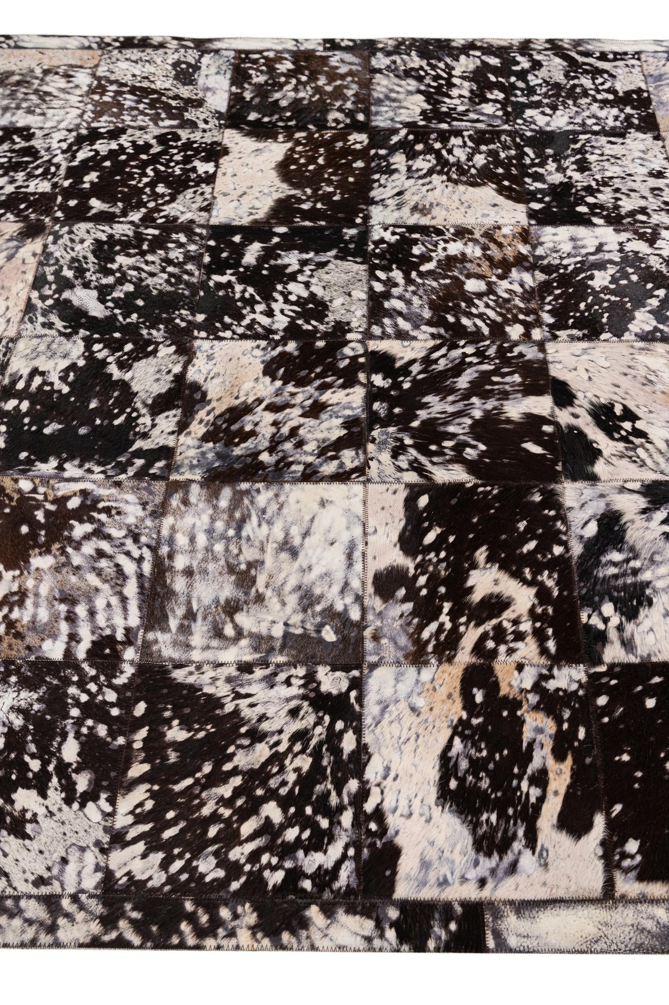 5' 2 x 8' Cowhide Stocks Rug