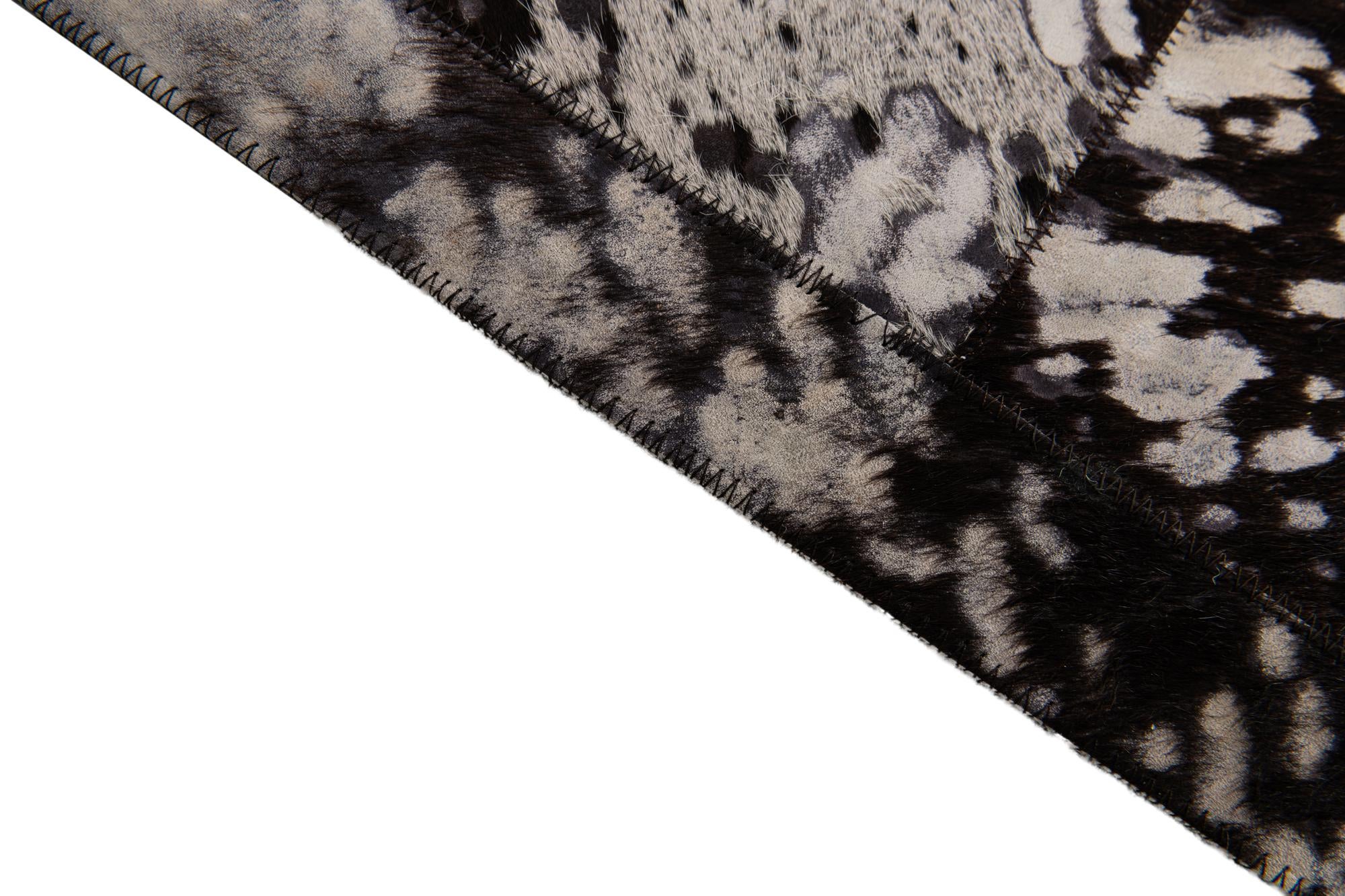 5' 2 x 8' Cowhide Stocks Rug