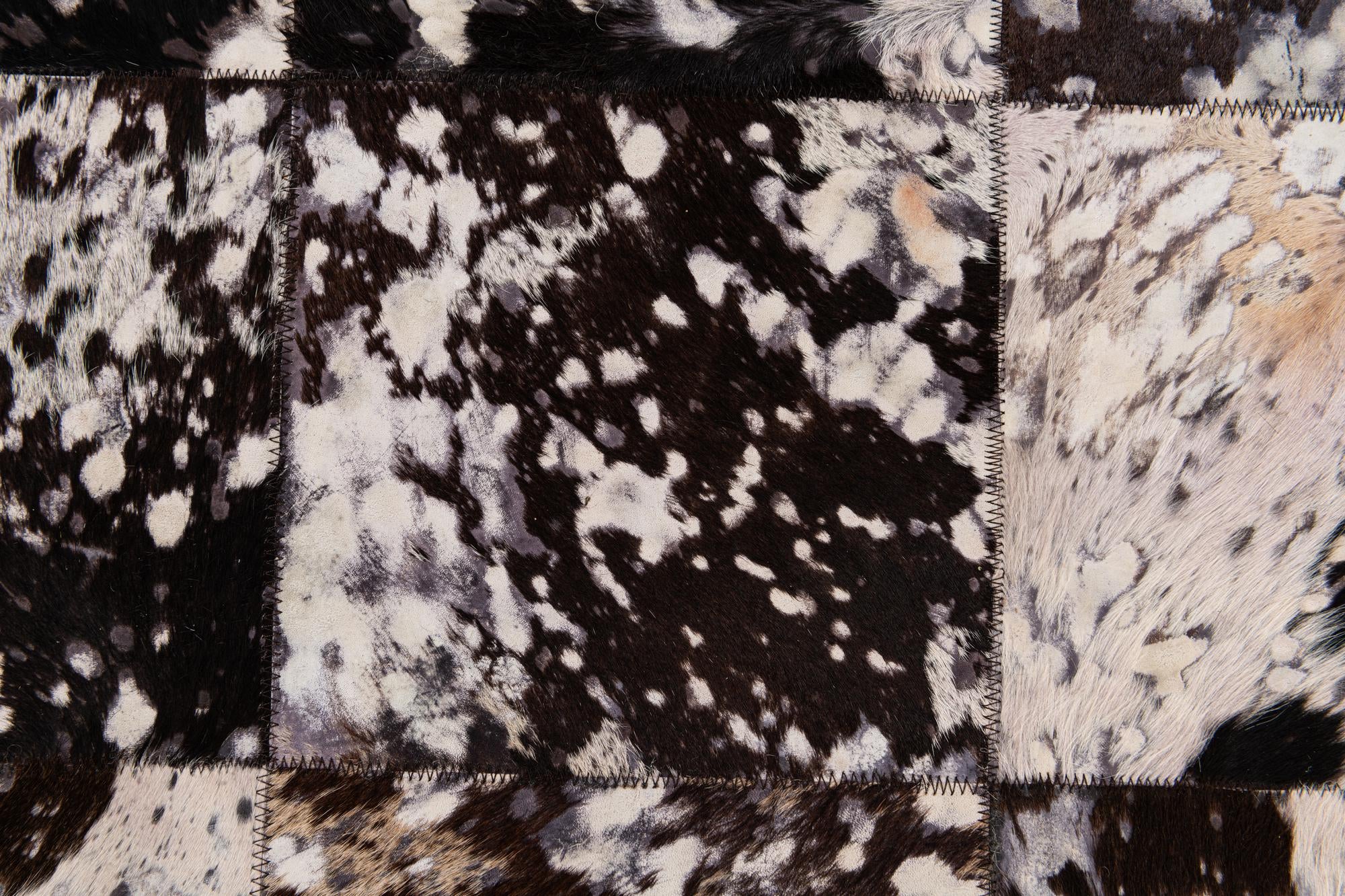 5' 2 x 8' Cowhide Stocks Rug
