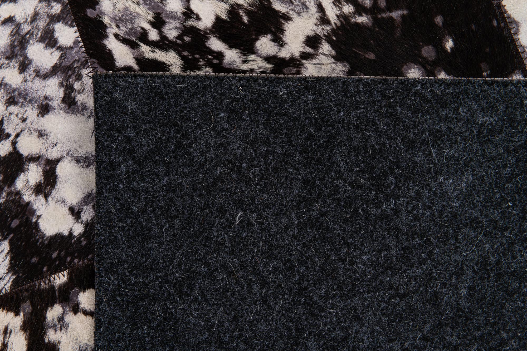 5' 2 x 8' Cowhide Stocks Rug