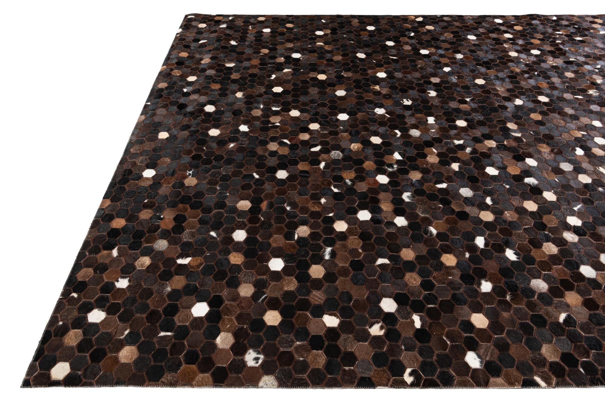 7' 11 x 10' Cowhide Stocks Rug