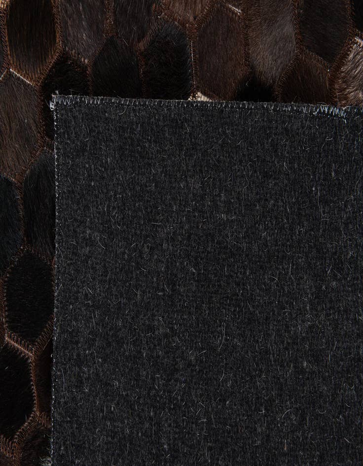 Detail image of 7' 11 x 10' Cowhide Stocks Rug