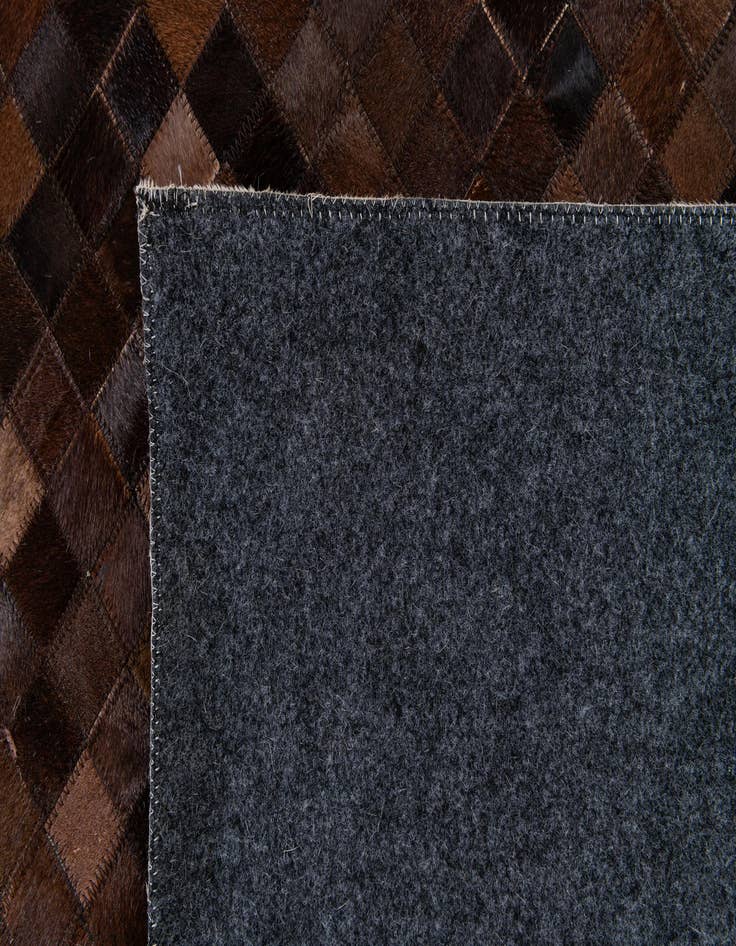 Detail image of 8' 2 x 10' 1 Cowhide Stocks Rug