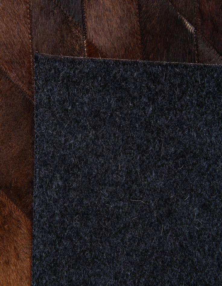 Detail image of 5' 8 x 7' 11 Cowhide Stocks Rug