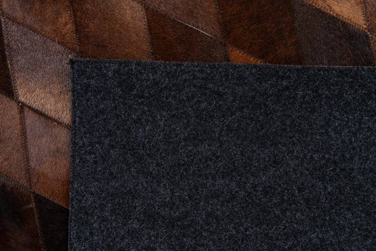 Detail image of 5' 8 x 7' 11 Cowhide Stocks Rug