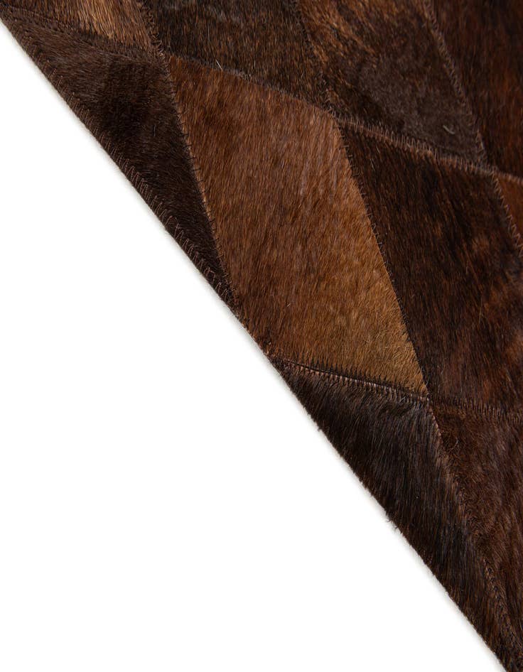Detail image of 4' 8 x 6' 6 Cowhide Stocks Rug