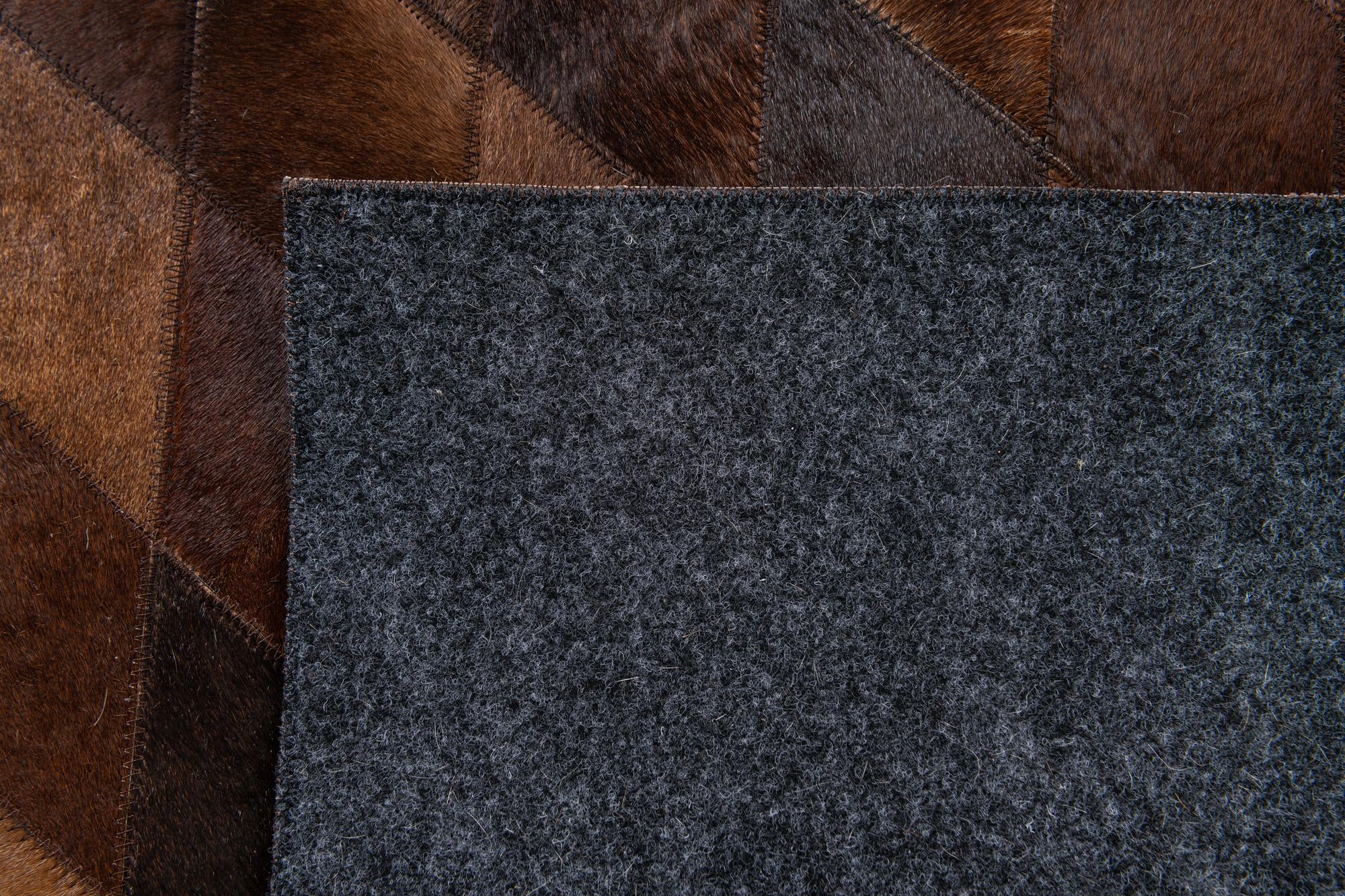 4' 8 x 6' 6 Cowhide Stocks Rug
