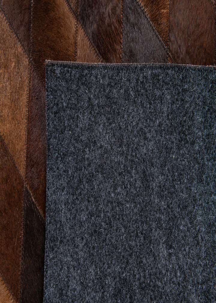 4' 8 x 6' 6 Cowhide Stocks Rug