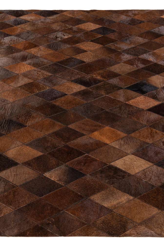 4' 8 x 6' 6 Cowhide Stocks Rug