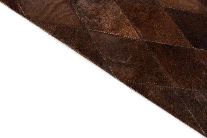 4' 8 x 6' 6 Cowhide Stocks Rug