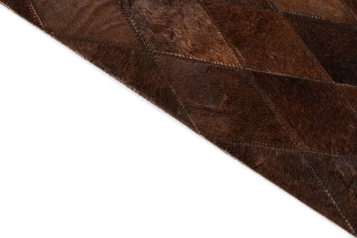 Detail image of 4' 8 x 6' 6 Cowhide Stocks Rug