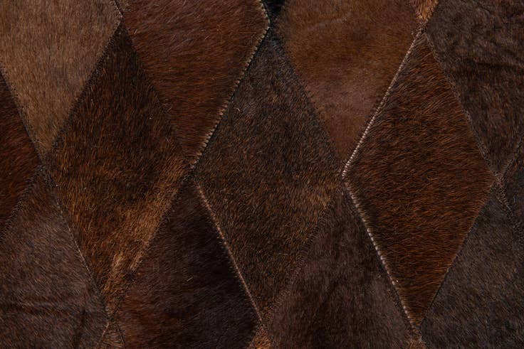 Detail image of 4' 8 x 6' 6 Cowhide Stocks Rug
