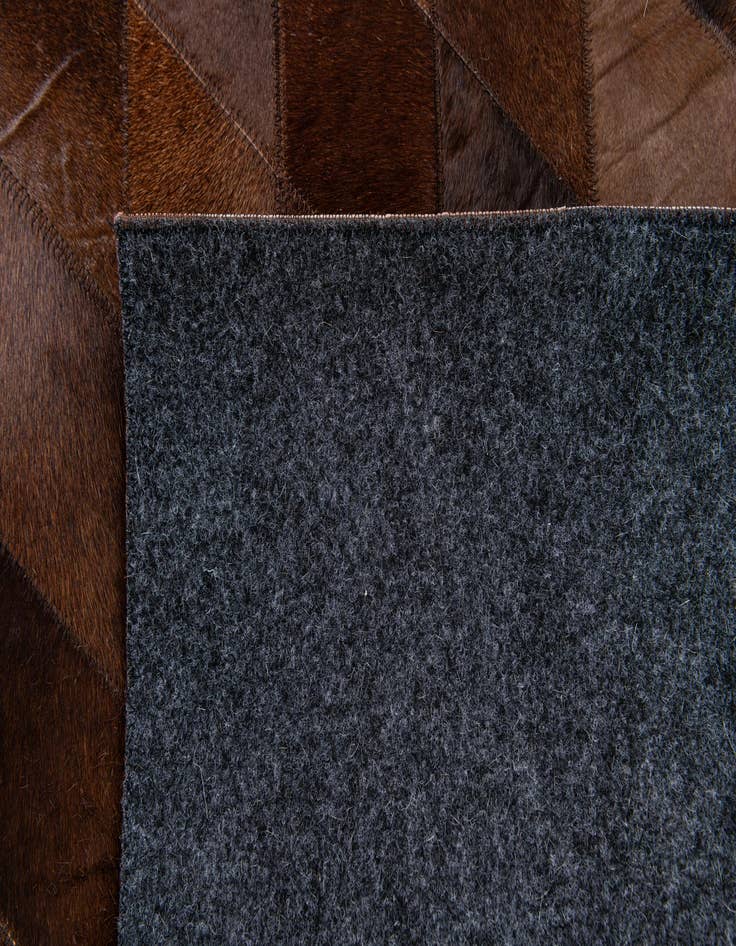 Detail image of 4' 8 x 6' 6 Cowhide Stocks Rug