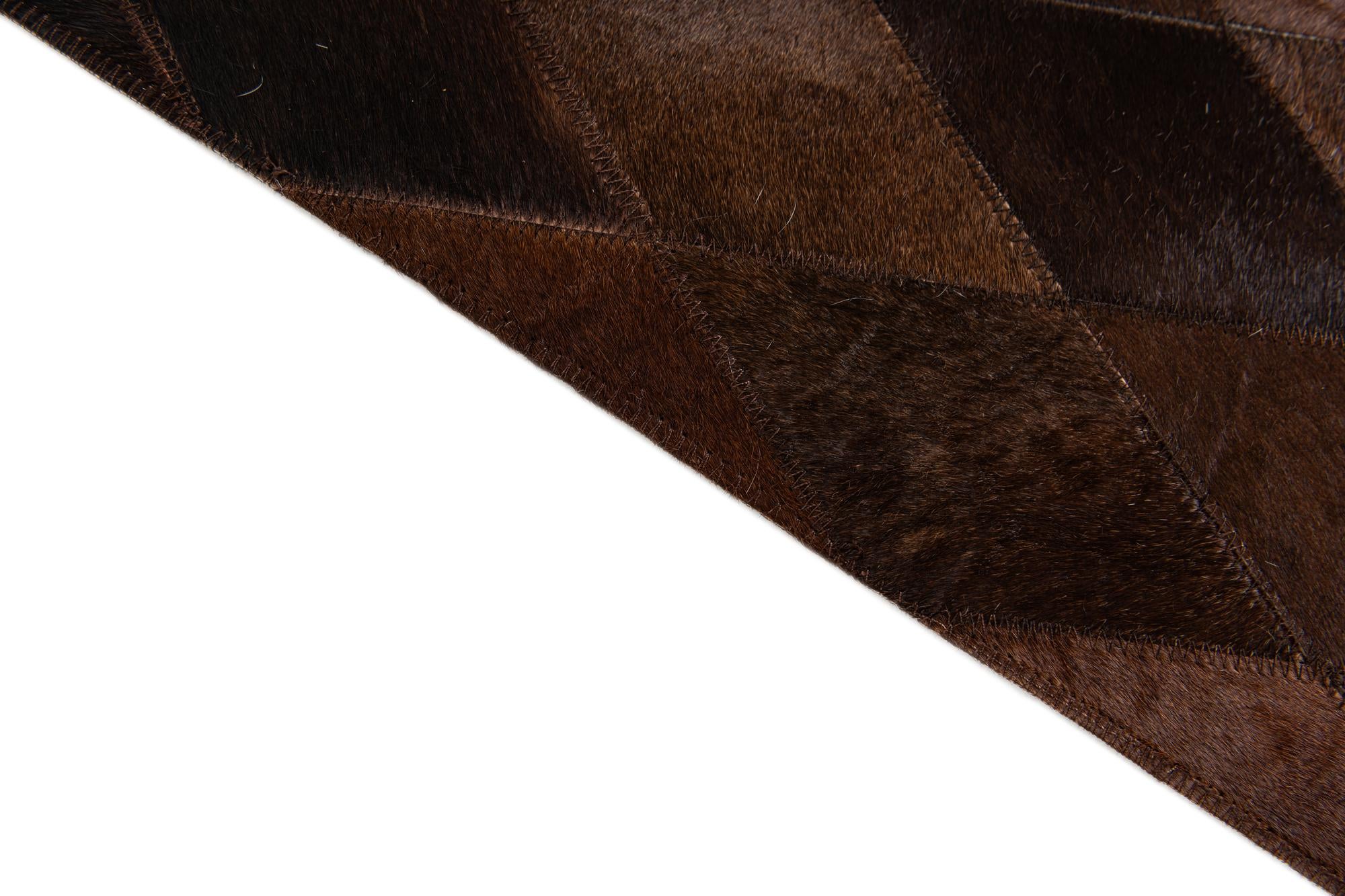 4' 8 x 6' 6 Cowhide Stocks Rug