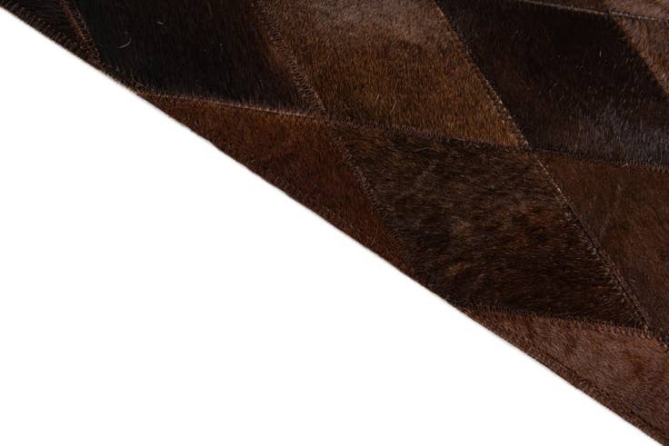 Detail image of 4' 8 x 6' 6 Cowhide Stocks Rug