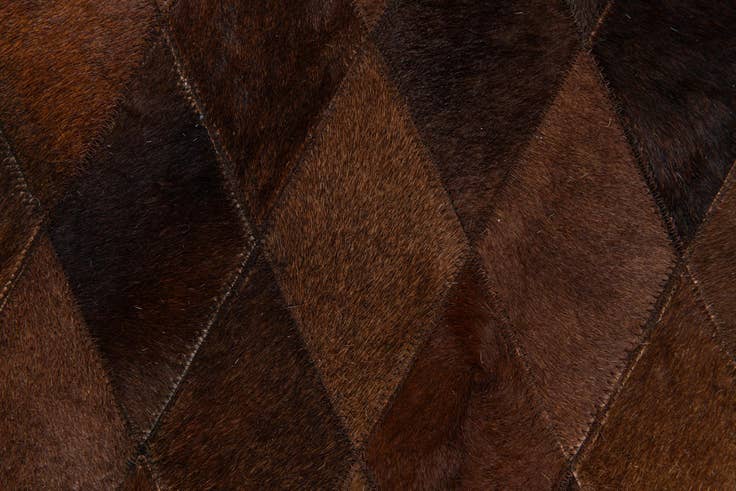 Detail image of 4' 8 x 6' 6 Cowhide Stocks Rug