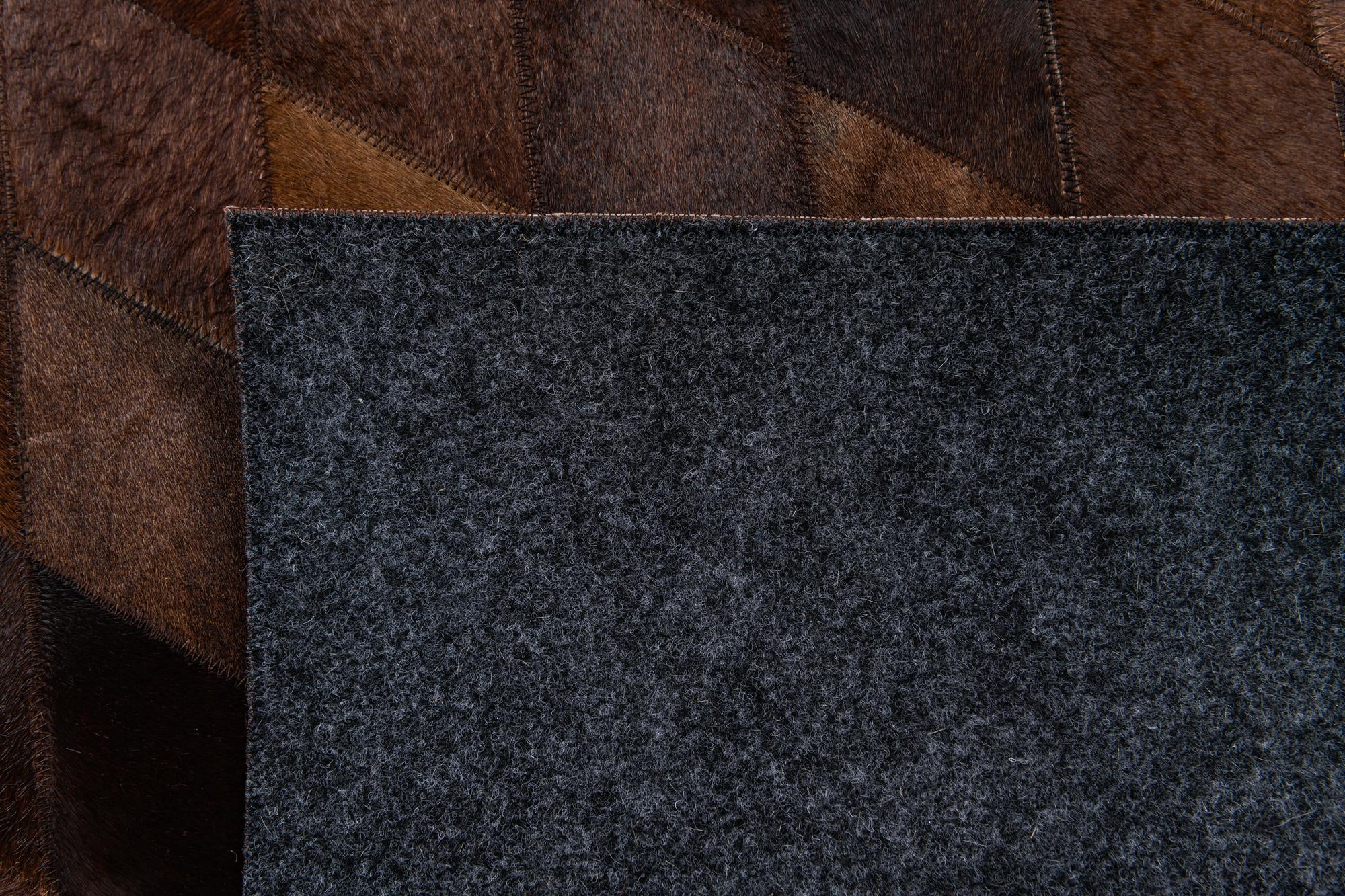 4' 8 x 6' 6 Cowhide Stocks Rug