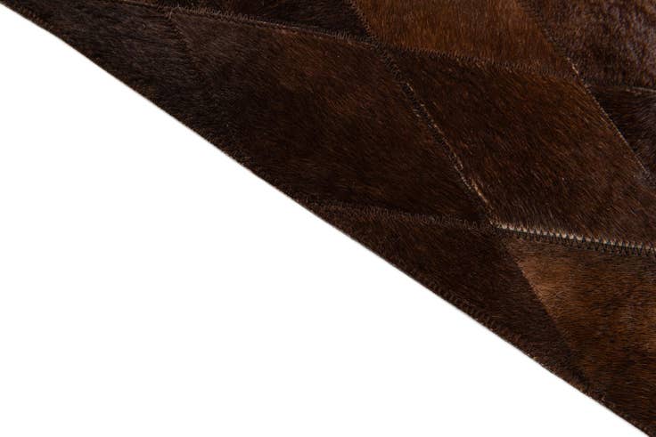 Detail image of 4' 7 x 6' 6 Cowhide Stocks Rug