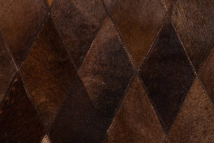 Detail image of 4' 7 x 6' 6 Cowhide Stocks Rug