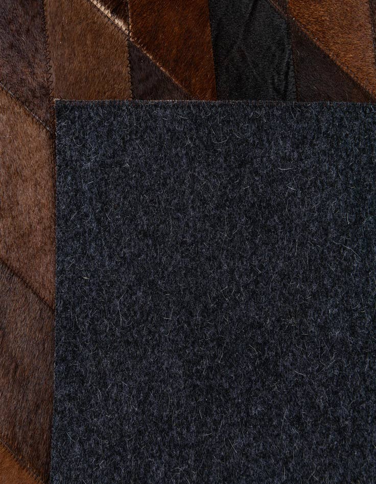Detail image of 4' 9 x 6' 8 Cowhide Stocks Rug