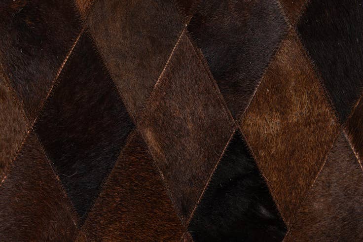Detail image of 4' 8 x 6' 9 Cowhide Stocks Rug